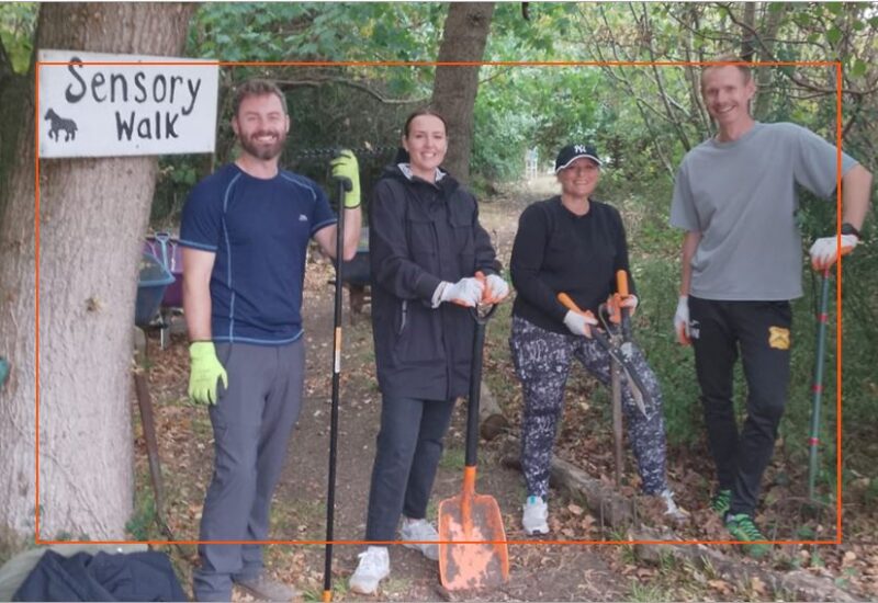 Member of Hartnell Taylor Cook volunteering to build a sensory garden sept 2025