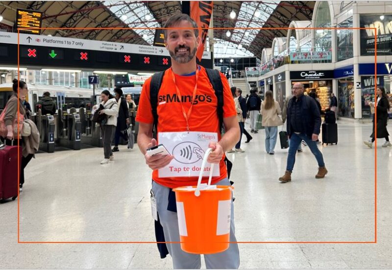 Henry Bruford of Hartnell Taylor Cook volunteering for St Mungos on World Homeless Day at Victoria Railway Station Oct 2025